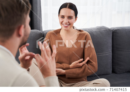 Dumb woman communicating nonverbal Dumb woman communicating nonverbal 71407415