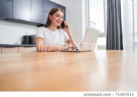 Girl having pleasure conversation Girl having pleasure conversation 71407814