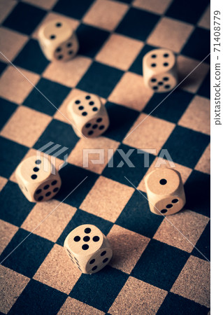 Dice on the checkerboard 71408779