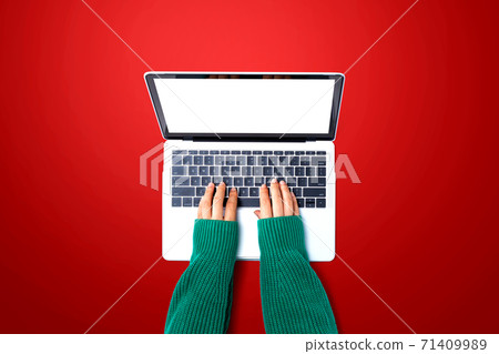 Person using a laptop computer Person using a laptop computer 71409989