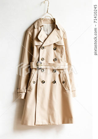 Light beige trench coat and white background 71410245