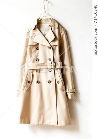 Light beige trench coat and white background 71410246