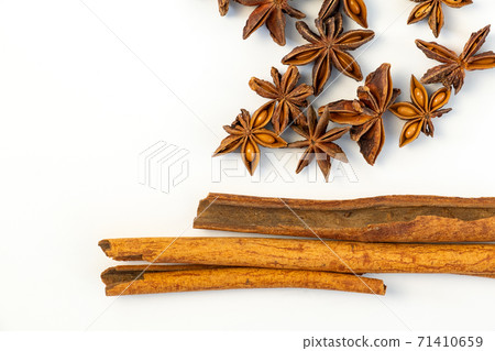 Assorted colorful spices on a white background. 71410659
