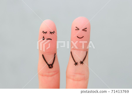 Fingers art of couple. Woman cries, man laughs. 71413769