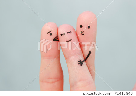 Fingers art. Concept boys kisses of girl on cheek. 71413846