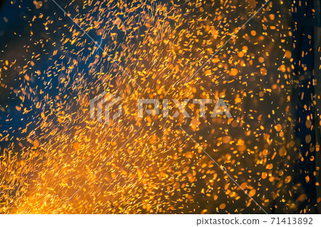 Flame and fire spark with bokeh on dark abstract background Flame and fire spark with bokeh on dark abstract background 71413892