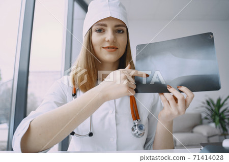 Woman doctor recording vlog video about medicin Woman doctor recording vlog video about medicin 71414028