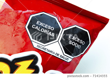 Calgary, Alberta. Canada. Nov 11 2020. Close up to a high sodium and calories warning. Calgary, Alberta. Canada. Nov 11 2020. Close up to a high sodium and calories warning. 71414355