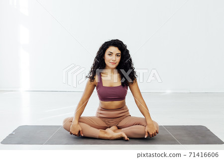Woman engaged in yoga class asana gymnastics fitness sport 71416606
