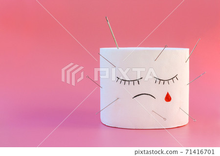 Toilet paper and blood. Concept of hemorrhoid treatment. 71416701