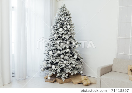 White snowy Christmas tree decor home New Year postcard 71418897
