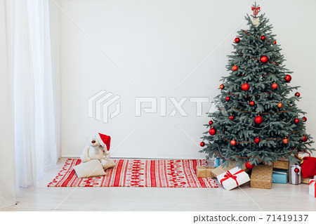 Christmas tree blue pine with gifts interior new year December postcard Christmas tree blue pine with gifts interior new year December postcard 71419137