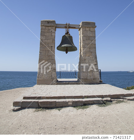 bell on the rocky seashore 71421317