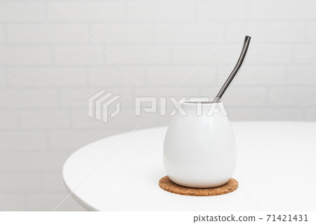 Yerba mate drink with caffeine in gourd 71421431