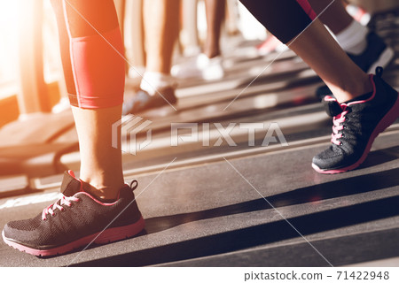 The legs of a man who walks along the path. The legs of a man who walks along the path. 71422948