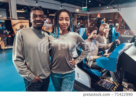 African American couple posing for photo.  71422990