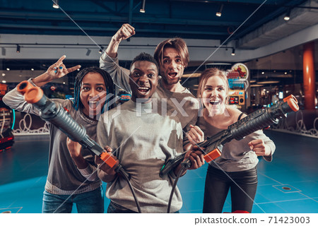 African American man with toy weapons in hands. African American man with toy weapons in hands. 71423003