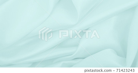 Smooth elegant blue silk or satin luxury cloth texture as abstract background. Luxurious background design Smooth elegant blue silk or satin luxury cloth texture as abstract background. Luxurious background design 71423243