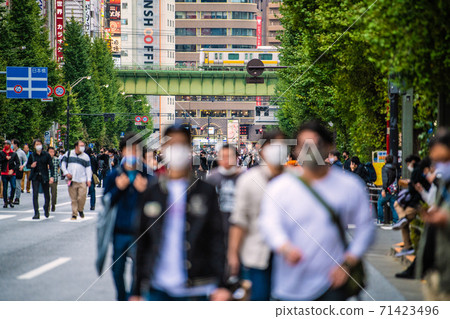 Tokyo cityscape of Japan Akihabara, Tokyo of Corona. This Sunday, full of people wearing masks = November 1st 71423496