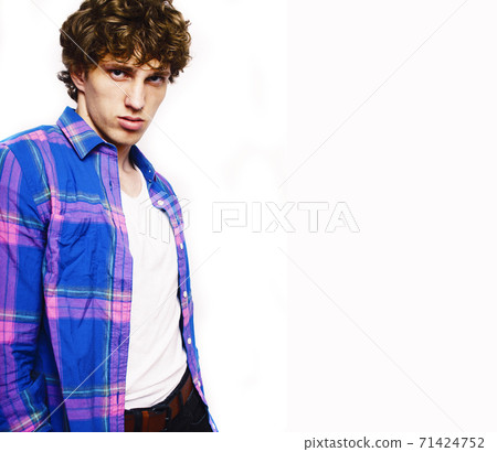young handsome teenage hipster guy posing emotional, happy smiling against white background isolated, lifestyle people concept young handsome teenage hipster guy posing emotional, happy smiling against white background isolated, lifestyle people concept 71424752
