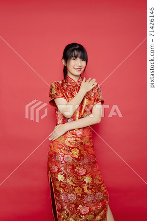 Asian woman wear Chinese dress with action Asian woman wear Chinese dress with action 71426146