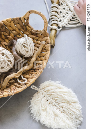 Handmade knitting macrame. Boho lifestyle. Hobby concept. Vertical frame Handmade knitting macrame. Boho lifestyle. Hobby concept. Vertical frame 71426759