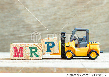 Toy forklift hold letter block P to complete word  MRP (Abbreviation of Material requirements planning) on wood background 71428167