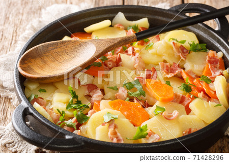 Tasty Tatws Pum Munud British dish close-up in a frying pan. Horizontal Tasty Tatws Pum Munud British dish close-up in a frying pan. Horizontal 71428296
