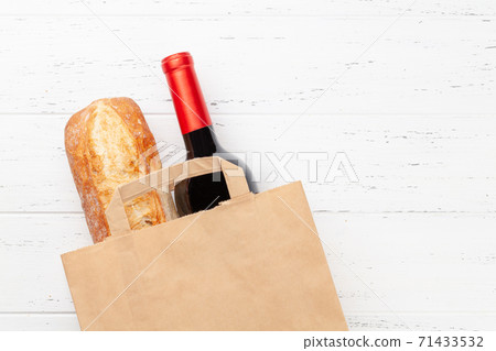 Different food in recycling paper bag 71433532