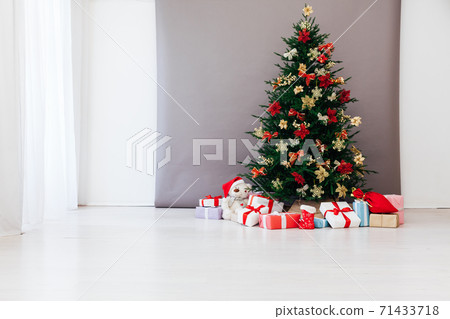 Christmas tree decor with gifts for the new year interior Christmas tree decor with gifts for the new year interior 71433718