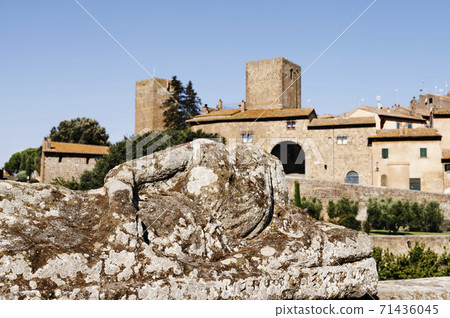 Tuscania-Italy -Panorama with etruscan sarcophagus 71436045