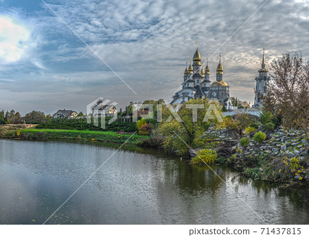 Landscape park and Temple Christian Orthodox complex the Church of St. Eugene on the banks of the Rostavitsya river. Buky, Ukraine 71437815