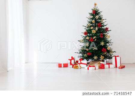 Christmas tree pine with gifts for the new year decor interior red white 71438547