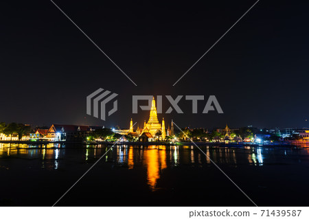 Wat Arun with Chao Phraya river at night in Bangkok, Thailand Wat Arun with Chao Phraya river at night in Bangkok, Thailand 71439587