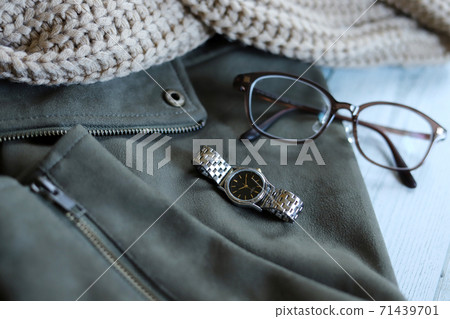 Riders jacket and snood, glasses and watch winter outfit fashion Riders jacket and snood, glasses and watch winter outfit fashion 71439701