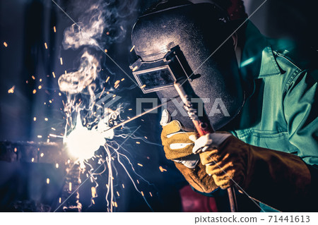 Metal welding steel works using electric arc welding machine Metal welding steel works using electric arc welding machine 71441613