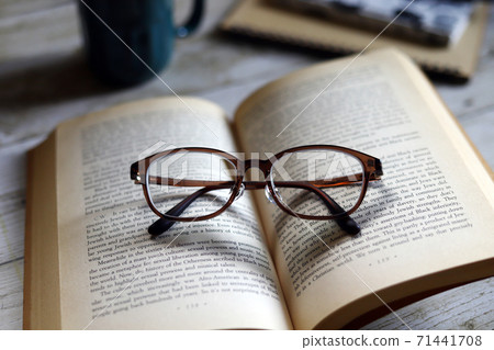 Reading books, glasses, coffee, reading, and relaxing time 71441708