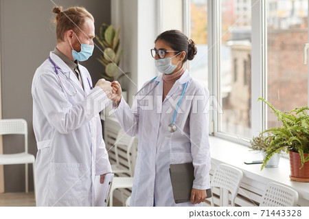 Two colleagues working at hospital Two colleagues working at hospital 71443328