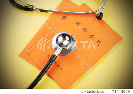 Pension notebook and stethoscope 71443609