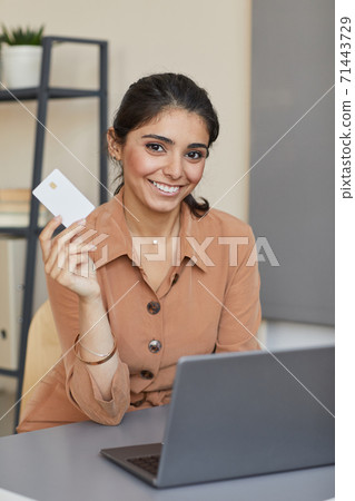 Woman buying online on laptop Woman buying online on laptop 71443729
