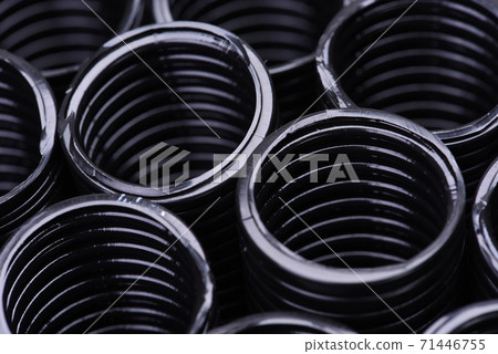 Corrugated pipe for installation of electrical cable, closeup Corrugated pipe for installation of electrical cable, closeup 71446755