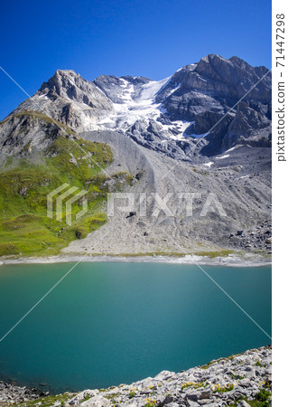 Long lake and Grande Casse Alpine glacier in French alps Long lake and Grande Casse Alpine glacier in French alps 71447298