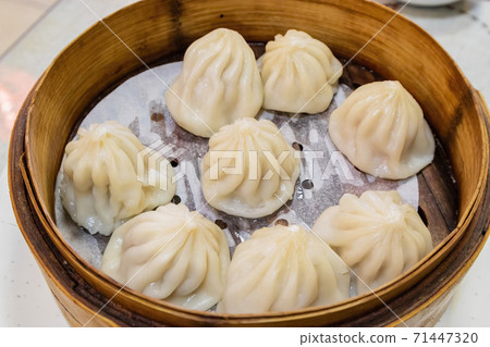 Close up shot of Chinese style steamed pork dumpling Close up shot of Chinese style steamed pork dumpling 71447320