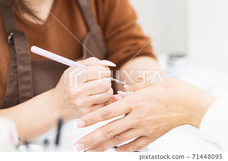 A woman giving a statement at a nail salon A woman giving a statement at a nail salon 71448095