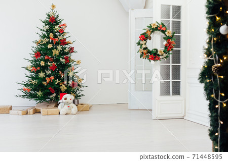 decoration decoration garland Christmas tree with gifts for the new year interior 71448595