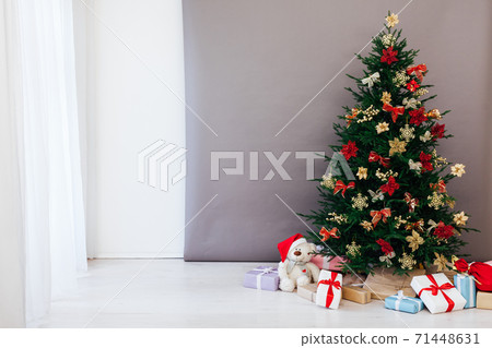 Christmas tree decor with gifts for the new year interior Christmas tree decor with gifts for the new year interior 71448631