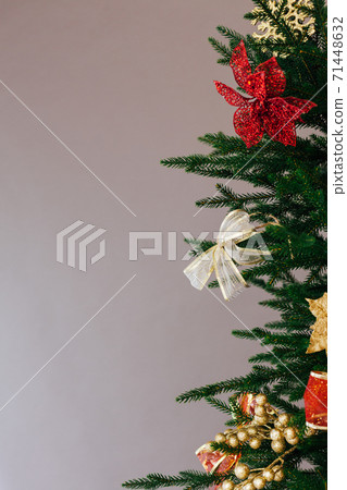 Christmas tree garland New Year's Eve place for inscription on grey background decor Christmas tree garland New Year's Eve place for inscription on grey background decor 71448632
