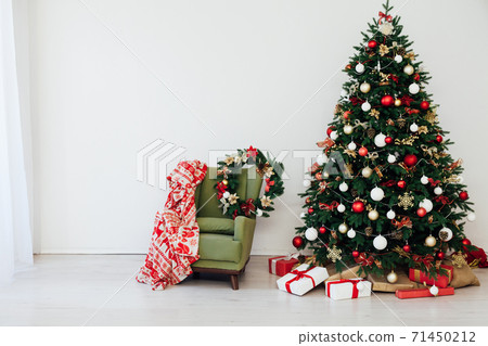 Christmas tree pine with gifts interior decor new year Christmas tree pine with gifts interior decor new year 71450212