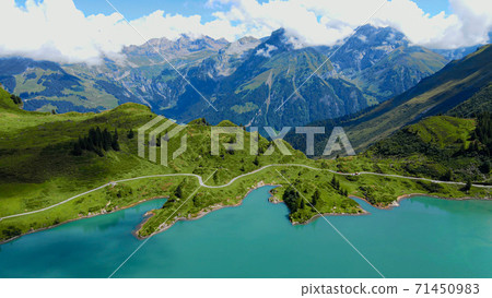 The beautiful mountain lake in the Swiss Alps - aerial view on Mount Titlis 71450983