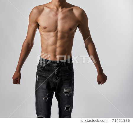 Sexy muscular man's body wearing jeans Sexy muscular man's body wearing jeans 71451586